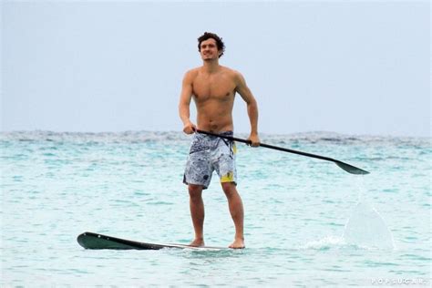 orlando bloom pictures on paddle board